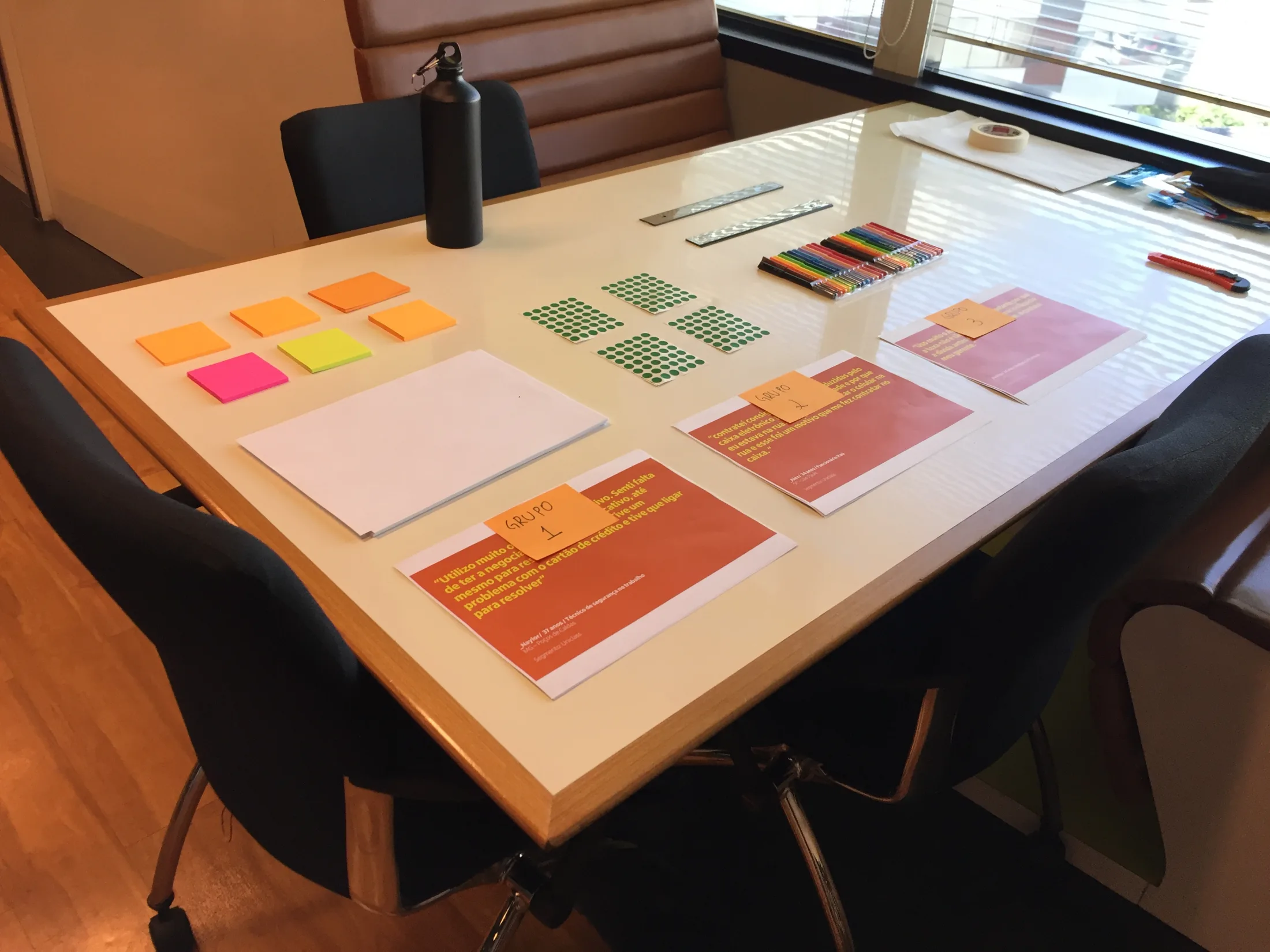 Credit co-creation materials arranged on a workshop table
